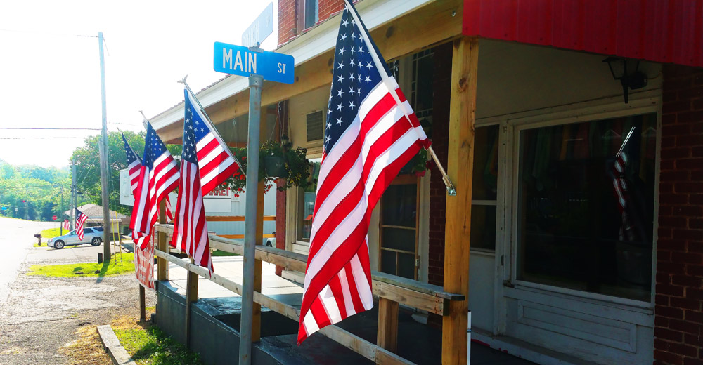 Flags outside of Corn-Fed Rascals.