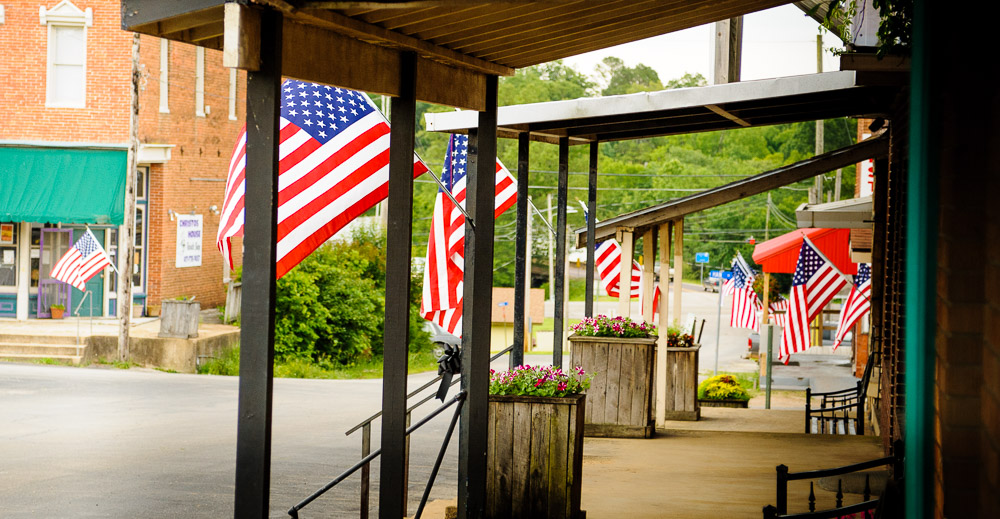 Flags hanging on Alton square.