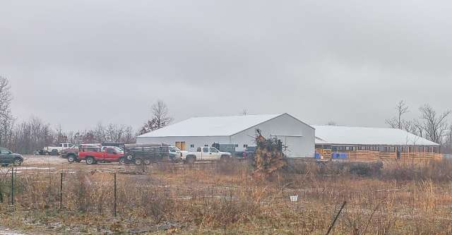 MO/ARK LIVESTOCK AUCTION LLC. Building on highway AA in Alton Missouri.