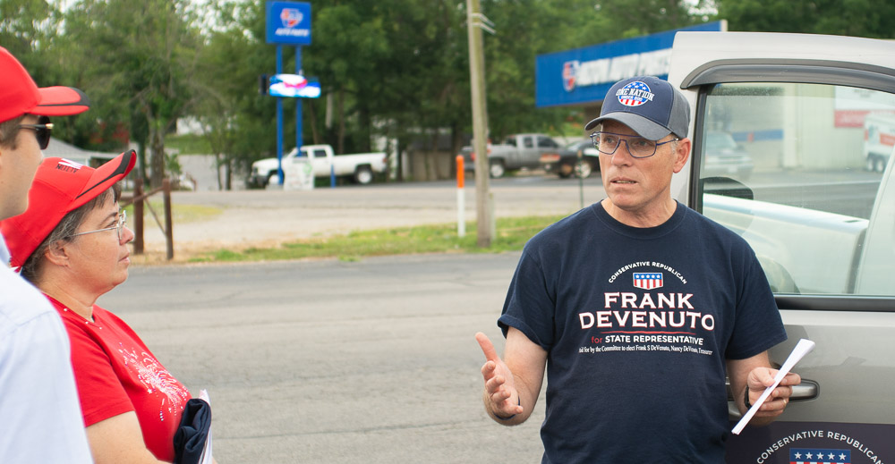 Frank Devenuto talking to citizens in alton.