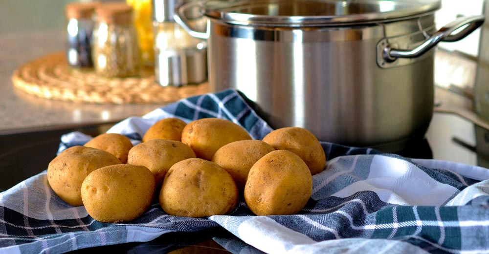 A bunch of potatoes ready to be boiled