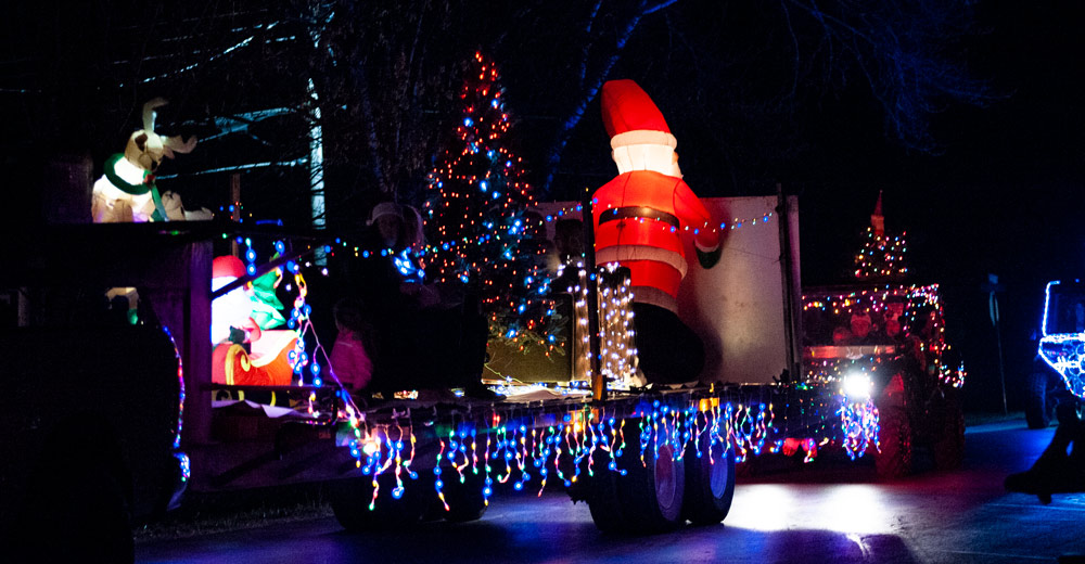 An inflatable santa on a lit up trailer in Alton's parade on December 4, 2021.