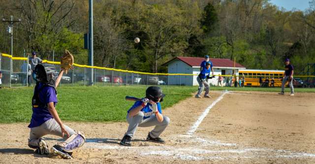 ALTON, MO – APRIL 26: Alton Comets batter ducks to let the ball fly overhead during the high school baseball game between the Alton Comets and the Winona Wildcats on April 26, 2022, at the Alton High School baseball field in Alton, MO. (Photo by Amanda Thomas/AltonMo.com)