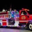 An Alton Fire Department firetruck participates in the Alton Christmas parade on December 2, 2023.