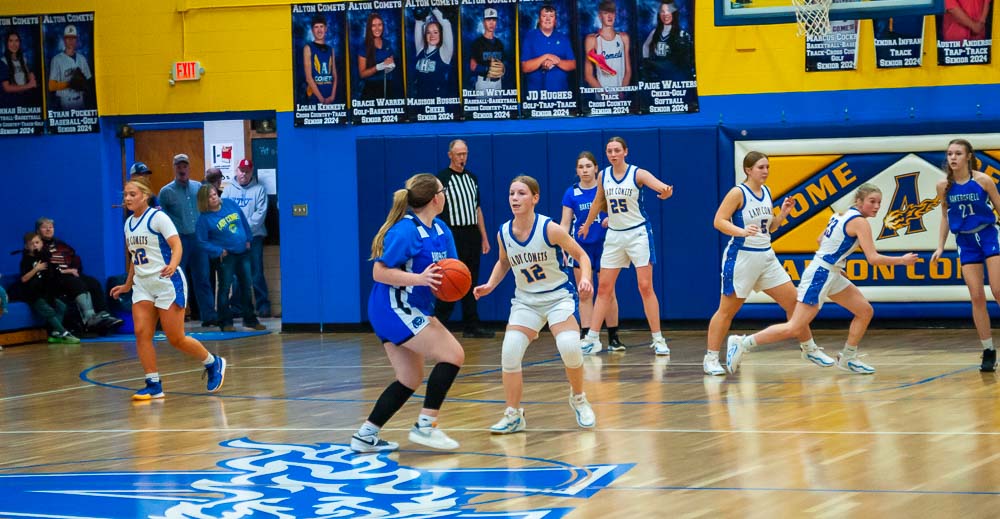 ALTON, MO – JANUARY 29: Alton Comets Jessica Green (12) looks to block a pass during the high school basketball game between the Alton Comets and the Bakersfield Lions on January 29, 2024, at the Alton High School Gym in Alton, Missouri. (Photo by Amanda Thomas/AltonMo.com)