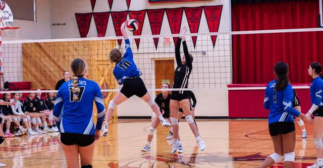 COUCH, MO – AUGUST 27: Koshkonong Blue Jay player spikes the ball across the net during the high school volleyball game between the Koshkonong Blue Jays and the Doniphan Donettes on August 27, 2024, at the Couch High School Gym in Couch, Missouri. (Photo by Amanda Thomas/AltonMo.com)