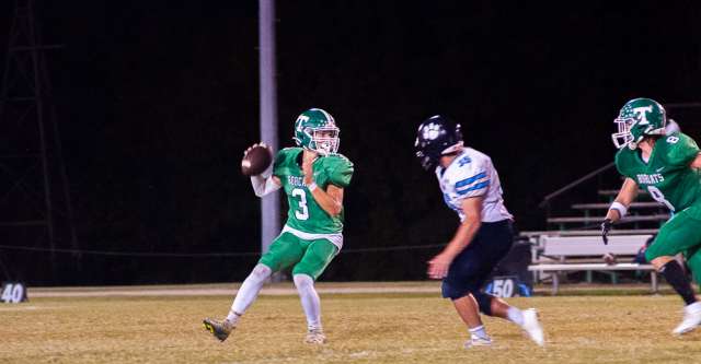 THAYER, MO – SEPTEMBER 20: Thayer Bobcats quarterback Colton Mills (3) looks down the field to make a throw during the high school football game between the Thayer Bobcats and the Salem Tigers on September 20, 2024, at the Thayer High School football field in Thayer, MO. (Photo by Amanda Thomas/AltonMo.com)