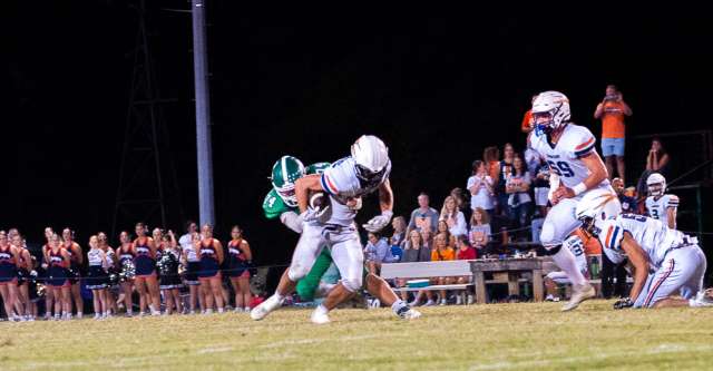 THAYER, MO – SEPTEMBER 6: Thayer Bobcats defensive lineman Cooper Clark (74) sacks the quarterback during the high school football game between the Thayer Bobcats and the Lighthouse Christian Chargers on September 6, 2024, at the Thayer High School football field in Thayer, MO. (Photo by Amanda Thomas/AltonMo.com