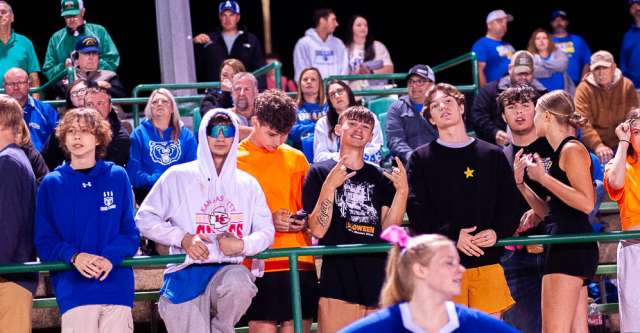 THAYER, MO – OCTOBER 11: Ava Bear fans pose for the camera during the high school football game between the Thayer Bobcats and the Ava Bears on October 11, 2024, at the Thayer High School football field in Thayer, MO. (Photo by Amanda Thomas/AltonMo.com)