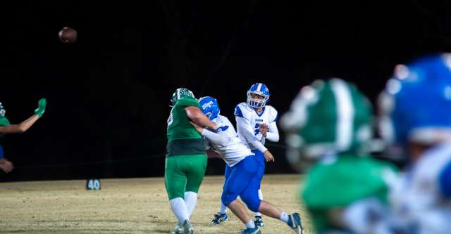 THAYER, MO – NOVEMBER 1: Clever Bluejay quarterback Rex Deters (3) throws a pass down the field during the high school football game between the Thayer Bobcats and the Clever Bluejays on November 1, 2024, at the Thayer High School football field in Thayer, MO. (Photo by Curtis Thomas/AltonMo.com)