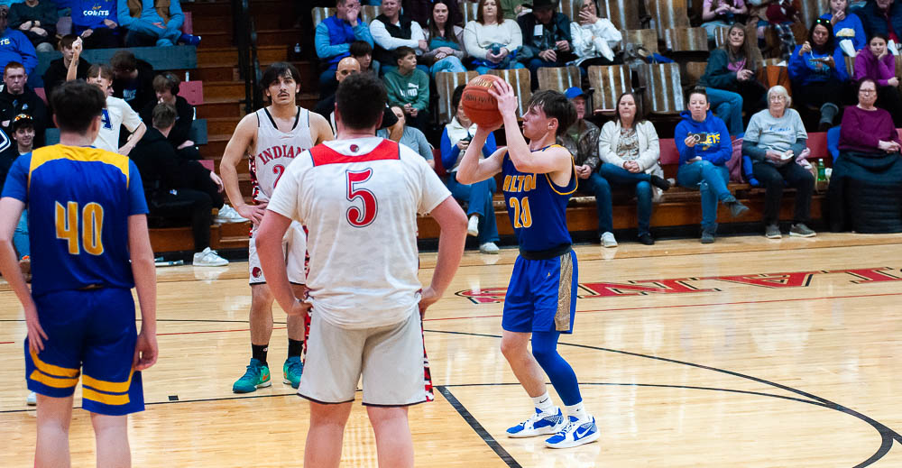 COUCH, MO – JANUARY 14: Alton Comets Kendrik Sechrest (20) shoots a free throw during the high school basketball game between the Alton Comets and Couch Indians on January 14, 2025 at the Couch High School Gym in Couch, Missouri. (Photo by Amanda Thomas/AltonMo.com)