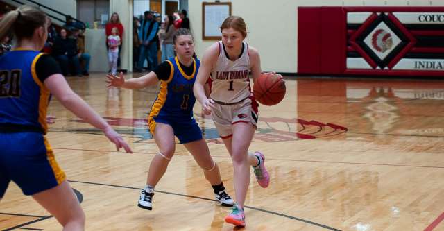 COUCH, MO – JANUARY 14: Couch Indian player (1) sprints down the court towards the basket during the high school basketball game between the Alton Comets and Couch Indians on January 14, 2025 at the Couch High School Gym in Couch, Missouri. (Photo by Amanda Thomas/AltonMo.com)