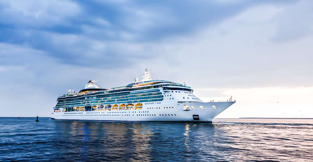 A cruise ship on an ocean.